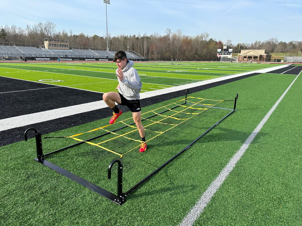 Rae Crowther Monster Running Rope with yellow netting - action shot showing athletes running through drill