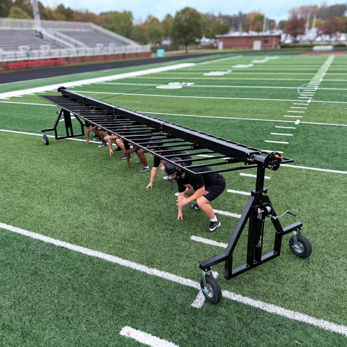 Rae Crowther 24ft Crank Chute with football players drilling - high angle view