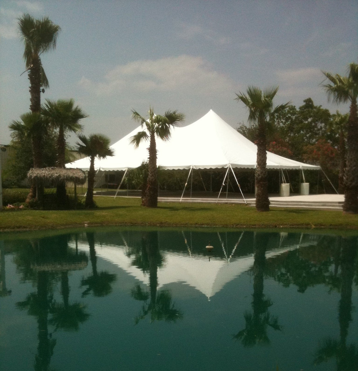 Ohenry 40' x 60' High Peak Pole Tent set up as a party tent for an outdoor event