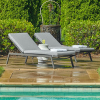 Uttermost Bea Outdoor Pool Chaise Lounge with charcoal gray cushion and java black aluminum frame
