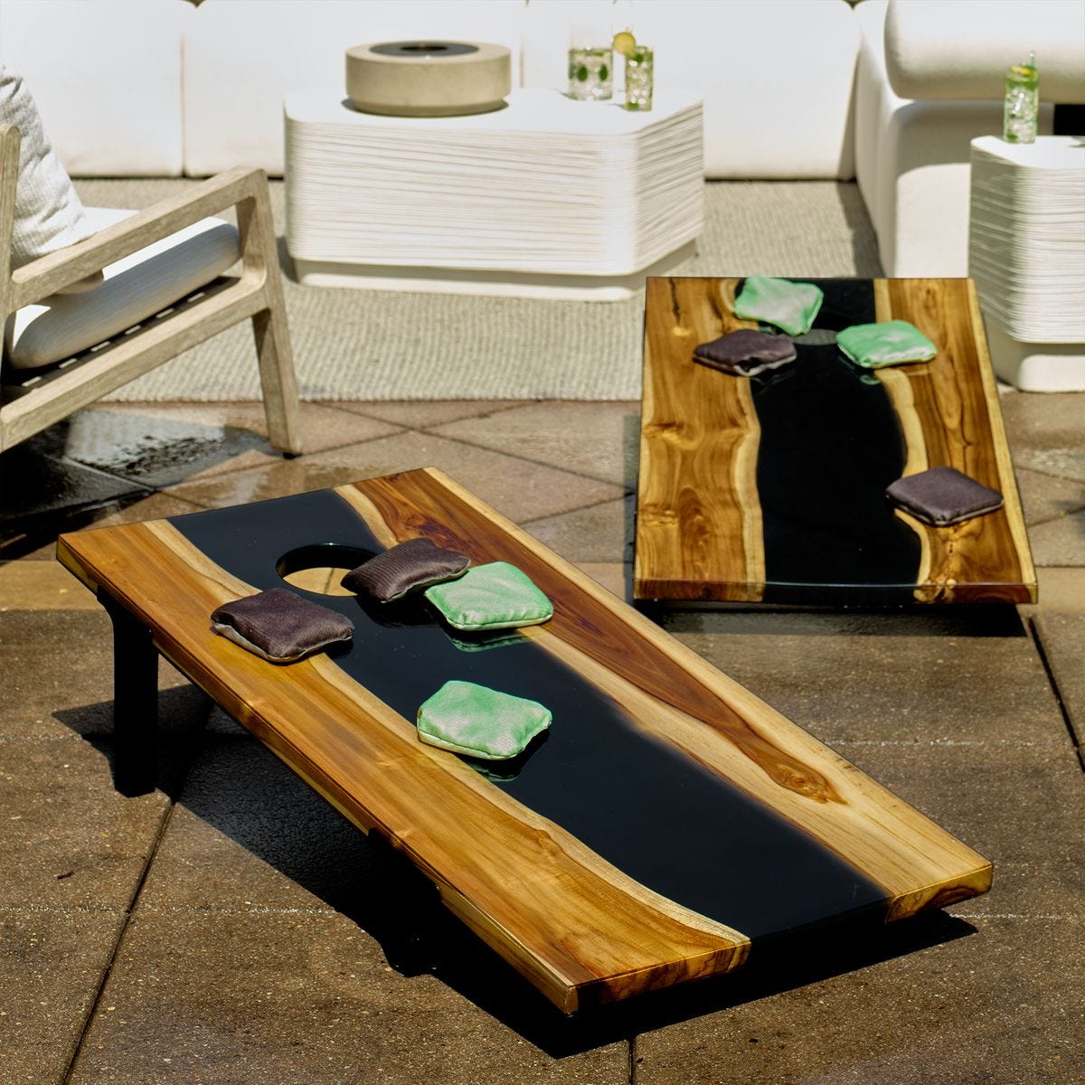Uttermost Clearwood Cornhole Game Set - natural teak boards with black river finish, hero view