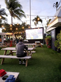 Epic Outdoor Cinema Pro 12 Complete System with inflatable screen, projector, and speaker setup
