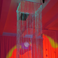 Fiber Optic Waterfall cascading 200 fiber optic strands through a 24-inch mirrored platform