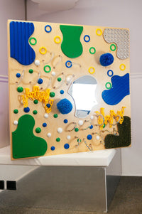 Tranquil Textured Wall sensory panel front view showing blue, green, and white textures and shapes
