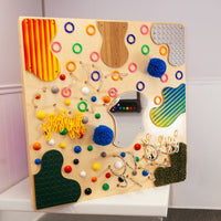 Textured Tactile Wall full panel view - 15 tactile textures on natural wood base, 48 x 47 inches