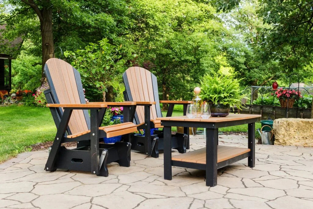 Timbercraft Poly Adirondack 2-foot glider chair in outdoor setting