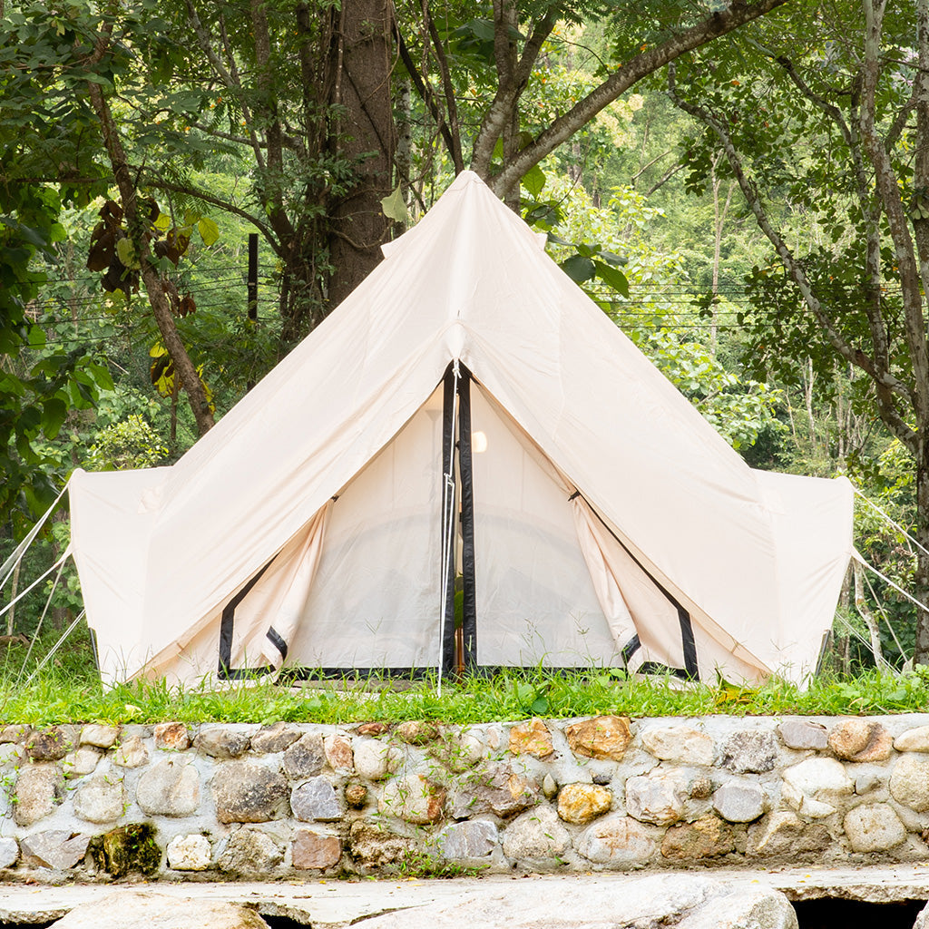 Trend Tents Brisa Glamping Tent front view - Lotus-style canvas cathedral with arched windows