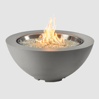 Outdoor Greatroom Cove Concrete Bowl Gas Fire Pit with flame on grey background