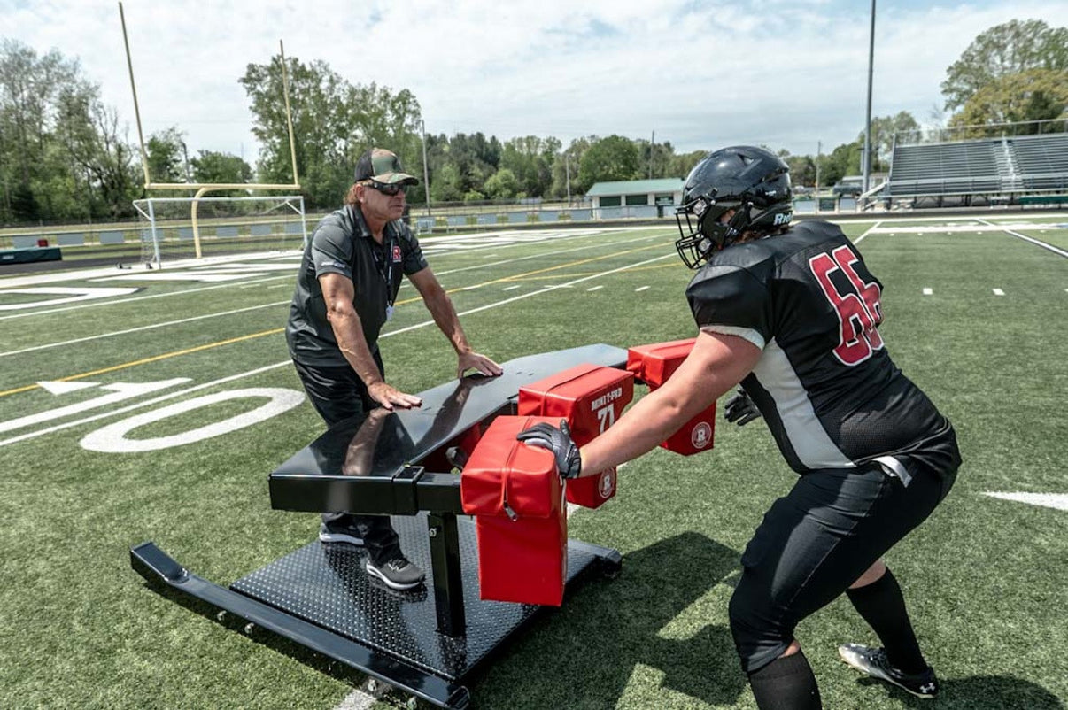 Rogers Athletic Three Read Machine - side angle view showing pad and frame