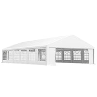 Outsunny 23 x 39 ft Heavy Duty White Party Tent with removable sidewalls and cathedral windows set up outdoors