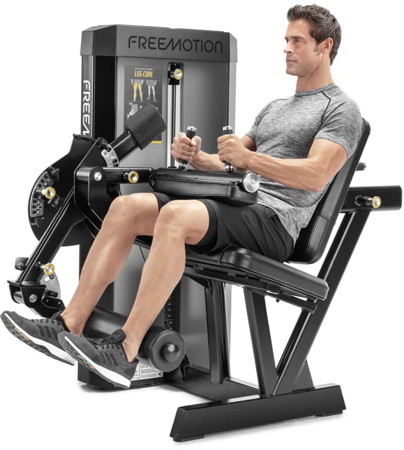 Freemotion EPIC Selectorized Leg Curl machine - male user three-quarter view