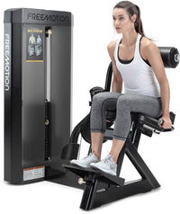 Freemotion EPIC Selectorized Back Extension machine - three-quarter view with user