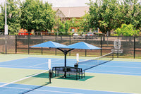 Square cantilever umbrella shades installed at Edmond Tennis Center athletic facility