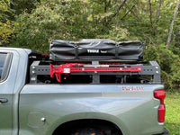 Fishbone Offroad Half Height Tackle Rack installed on Chevy Silverado long bed - front angle view