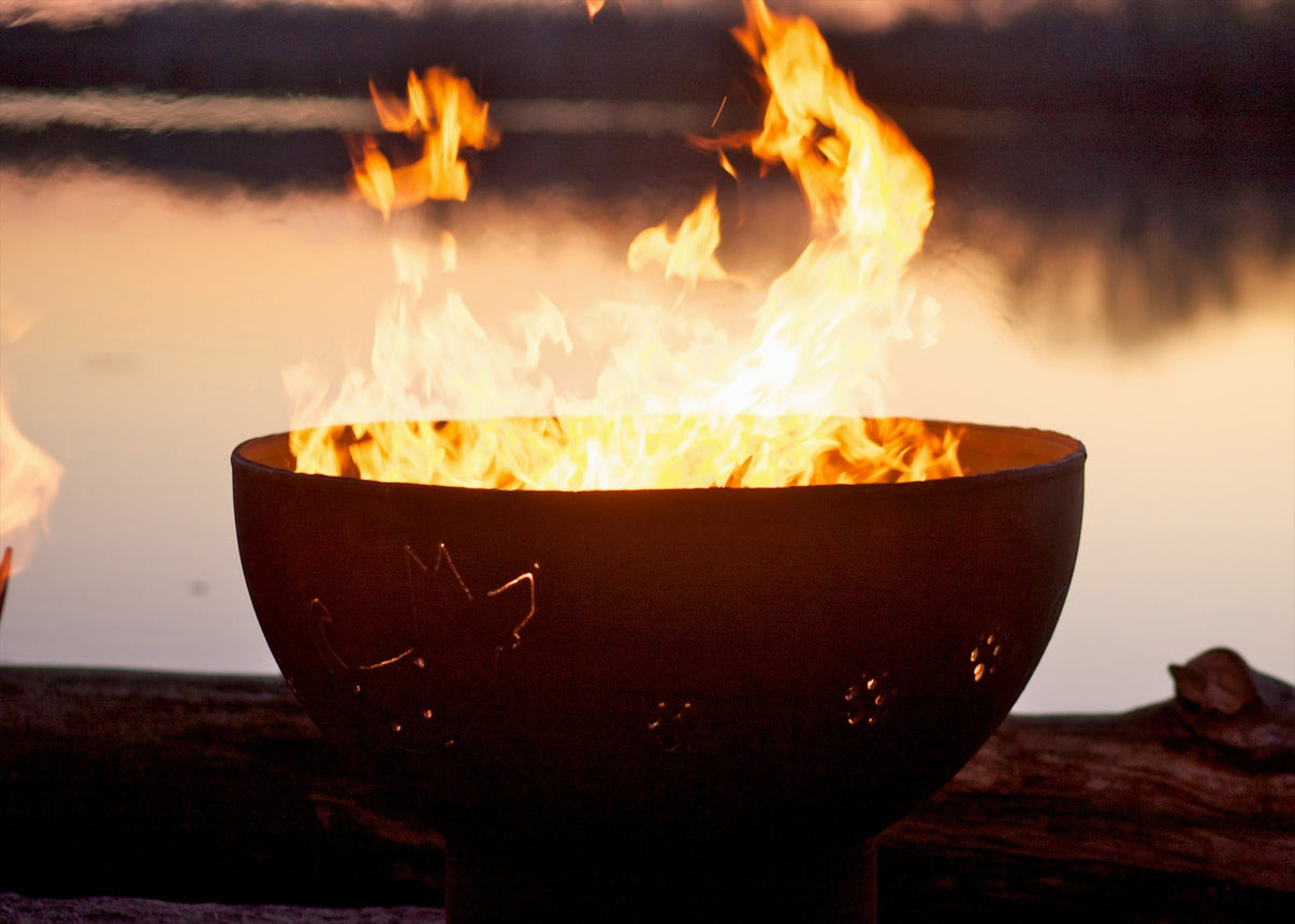 Fire Pit Art Funky Dog steel fire pit with iron oxide patina finish - side view