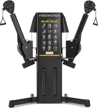Freemotion Genesis Dual Cable Cross Lite cable machine with arms raised, shown in black finish