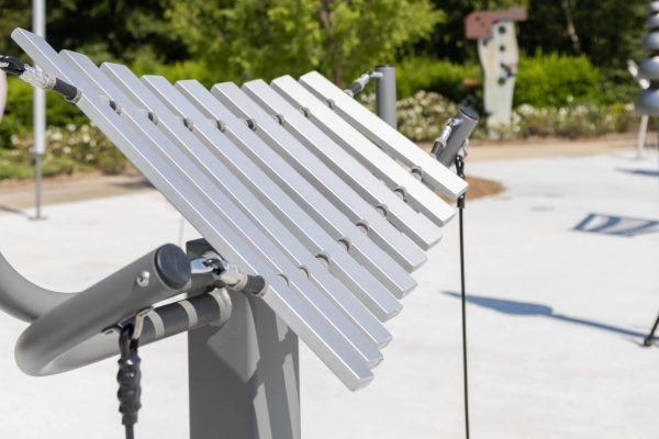 Freenotes Aria silver metallophone installed in outdoor play area