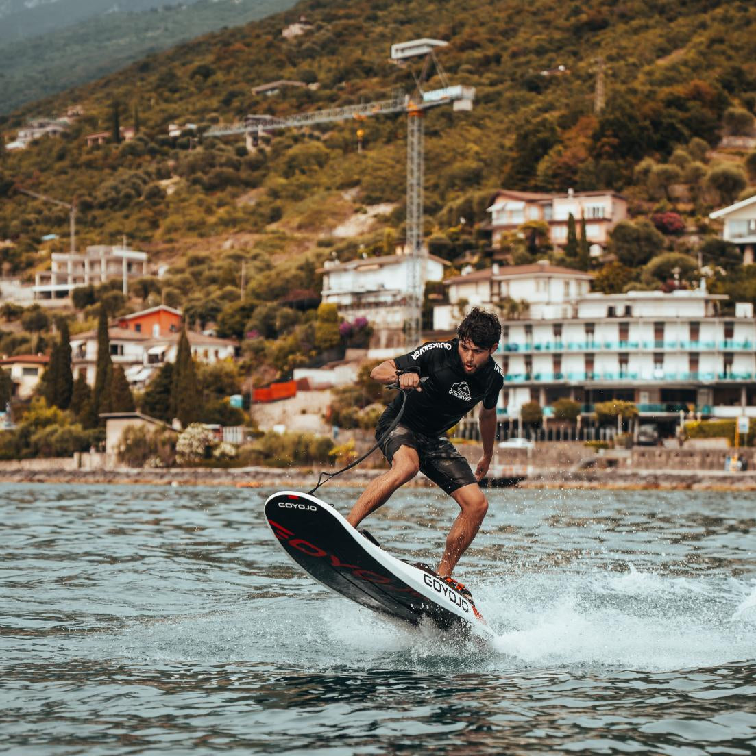 Goyojo V-RS Ultimate Electric Surfboard - hero shot on water