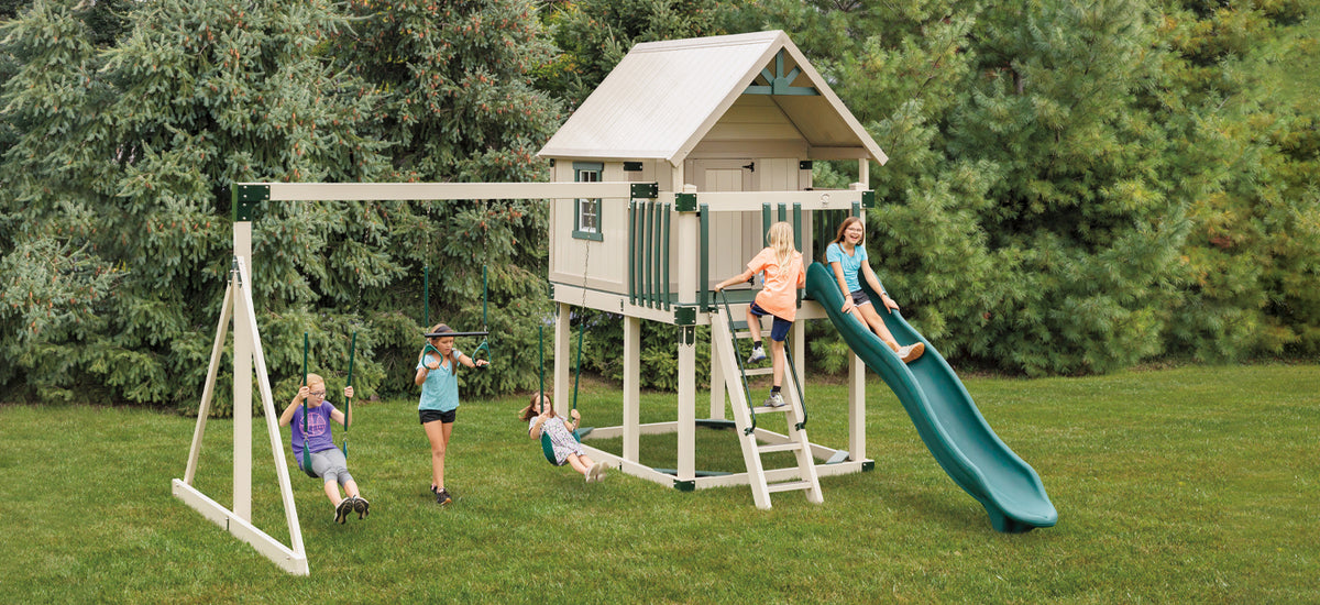 Happy Hideout Swing Set Package H68-2 with playhouse, Ripple Rush Slide, belt swings, and trapeze