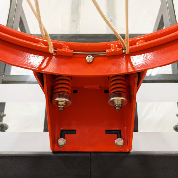 Close-up of the 2-spring breakaway rim mechanism