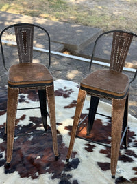 Alamo Saddlery 30 inch black swivel bar stool with chocolate cowboy stitch - side view