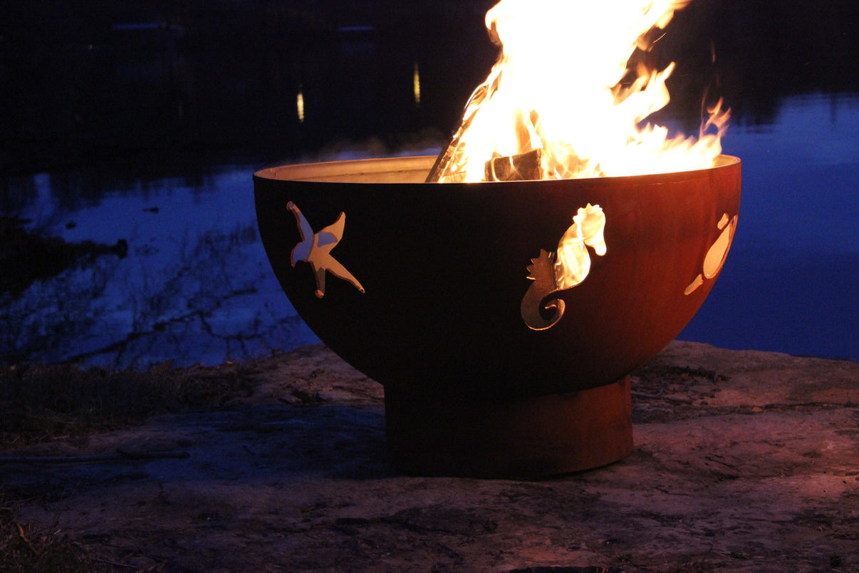 Fire Pit Art Sea Creatures steel fire pit showing Starfish, Sea Horse, and Sea Turtle design cutouts with Iron Oxide Patina finish