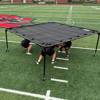 Rae Crowther Jam Tent with players drilling at high angle view