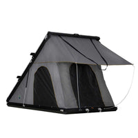 OVS HD Mamba III 3 Person Clam Shell Hard Shell Roof Top Tent in Grey and Green mounted on a vehicle