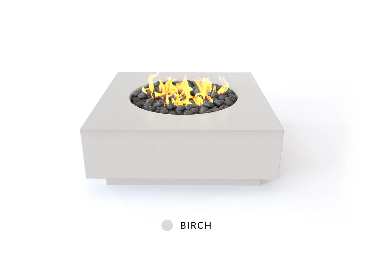 Studio Nisho Cronus 48-inch square GFRC fire pit in Birch finish with flames lit