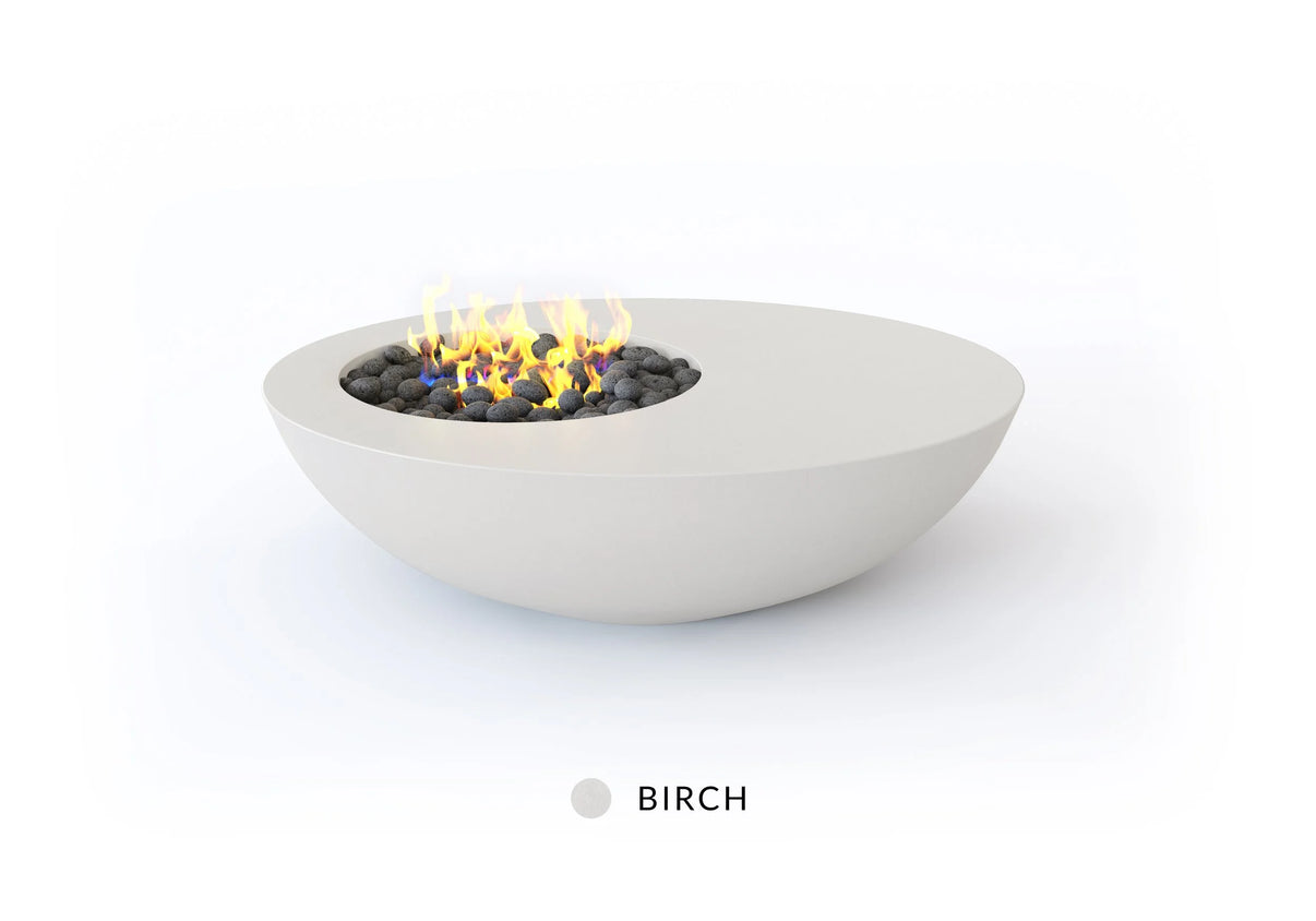 Studio Nisho Nyx GFRC outdoor fire pit in Birch finish, lit flame, full view