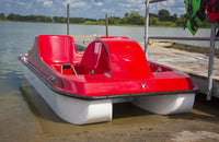 Kay Park 4-Person Red Fiberglass Pedal Boat on water - lifestyle scene