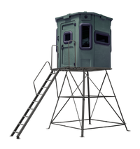 Titan Pro Archery & Rifle Combo Blind in Forest Green mounted on 8ft tower with ladder, front view