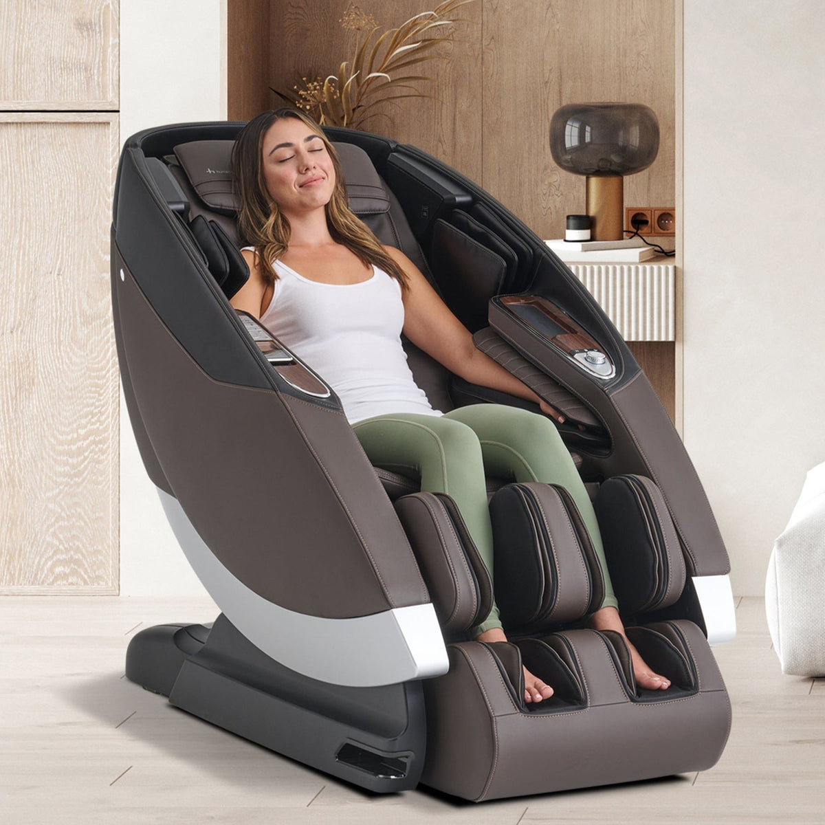 Human Touch Super Novo 2.0 Massage Chair Espresso in-room lifestyle photo with model