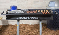 Kay Park XB16 group grill with two pedestal in-ground mount, front angle view showing full cooking surface and black enamel finish