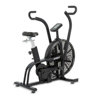Spirit AB950 Air Bike - front three-quarter view showing 27-inch fan flywheel and dual-action handlebars