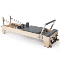 Elina Pilates Elite Reformer in grey upholstery - full view, rock maple wood frame