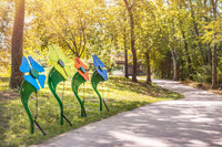 Freenotes Flowers Musical Bell Ensemble installed along a walking trail in a park