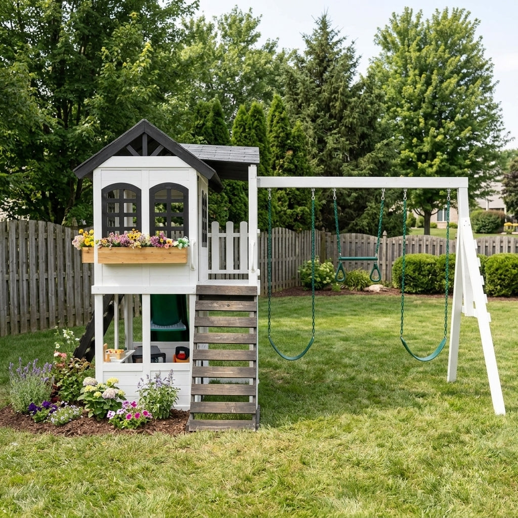 White two-story playhouse with swing set installed in a backyard