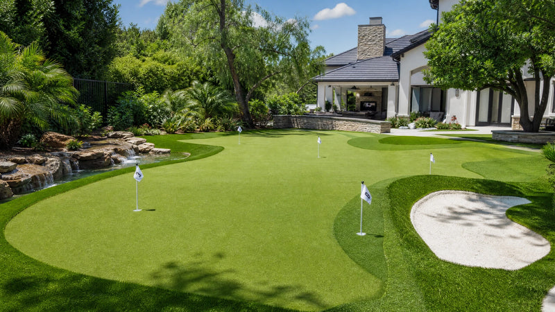 Custom backyard putting green with tour-grade synthetic turf installed in Omaha