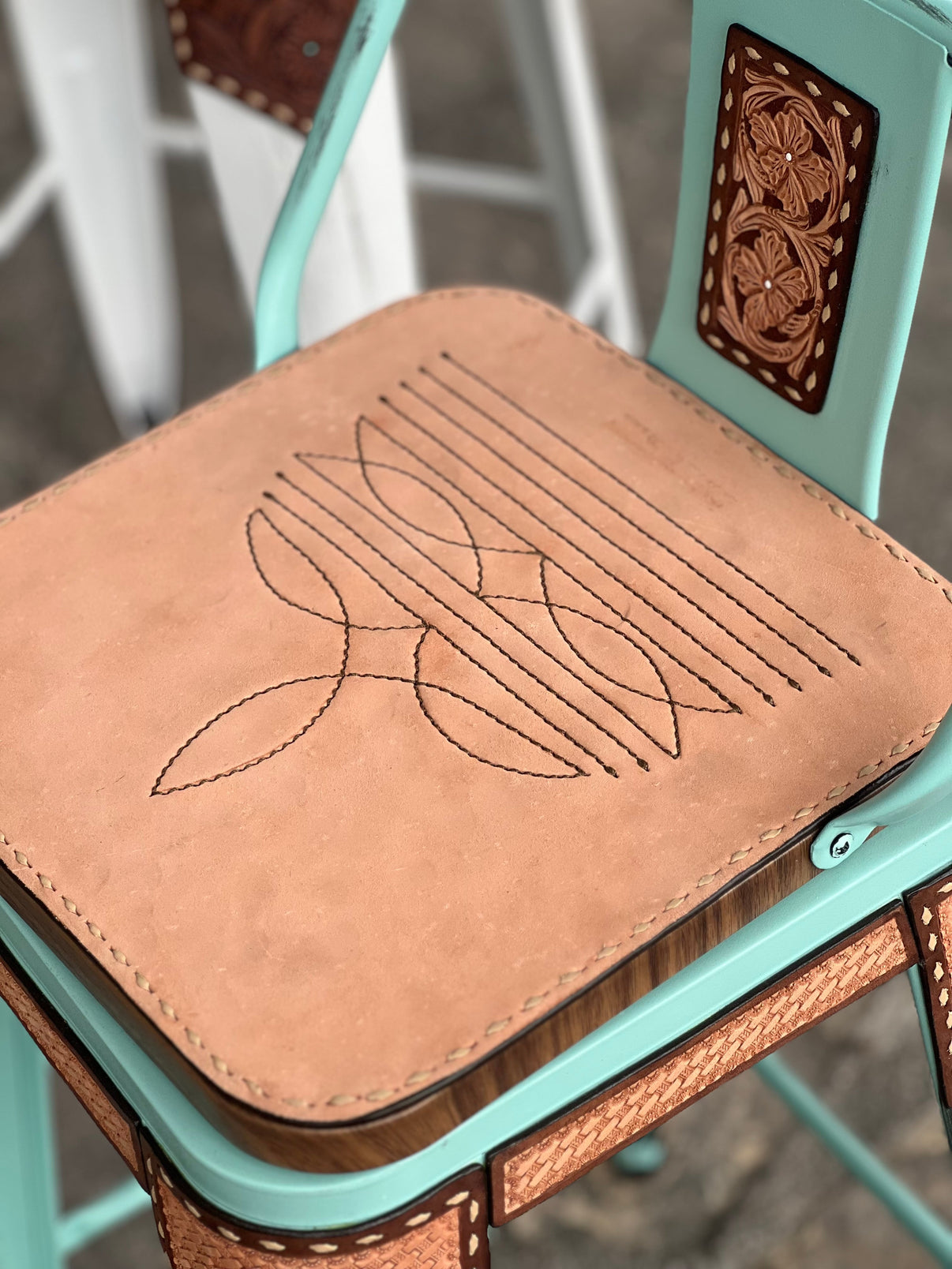 Alamo Saddlery Cowboy Stitch Swivel Bar Stools with short back in Black frame with hand-tooled leather detail