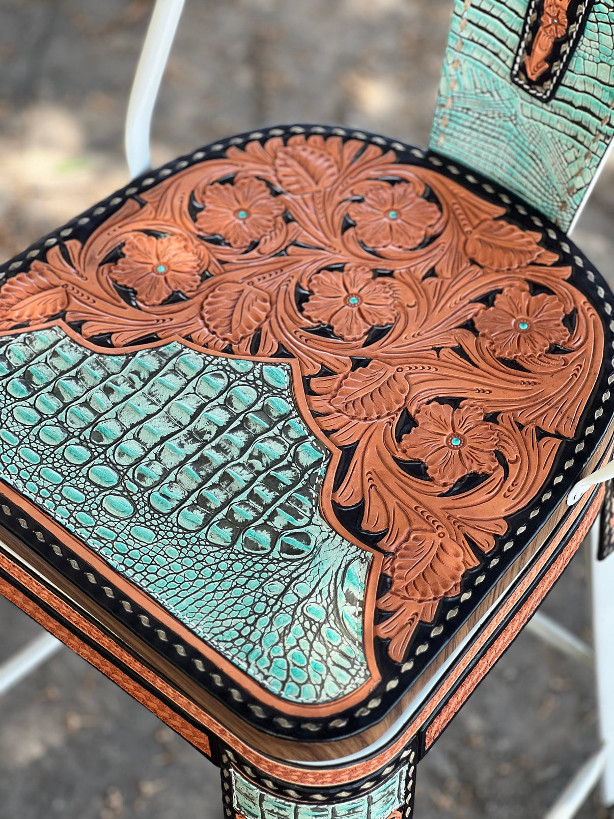 Alamo Saddlery 30 inch Turquoise Gator hand tooled leather bar stool with tall back in white - front view
