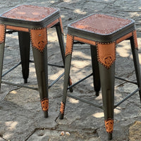 Alamo Saddlery Cinnamon hand tooled leather bar stools with gun metal frame
