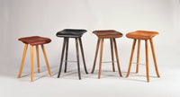 Tractor Seat Bar Stools by Enrico Bartolini