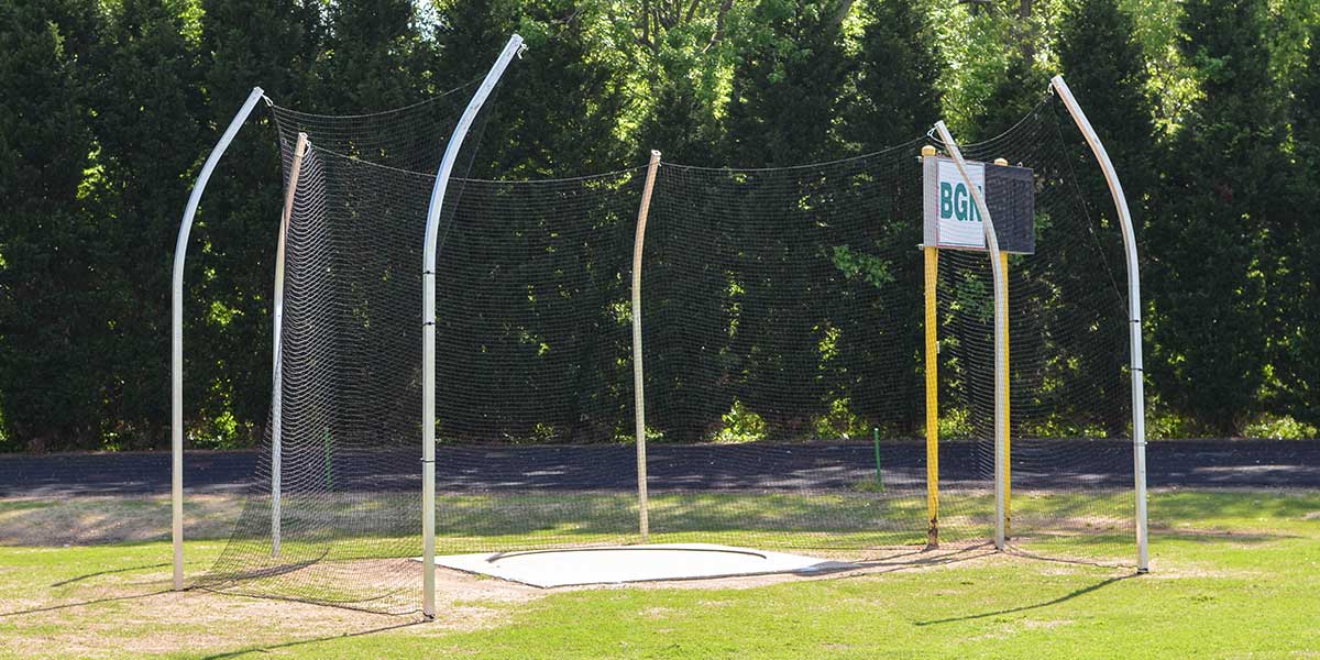 Fisher Athletic DC1300 Aluminum Discus Cage with Ground Sleeves - 55 foot wide competition throwing cage