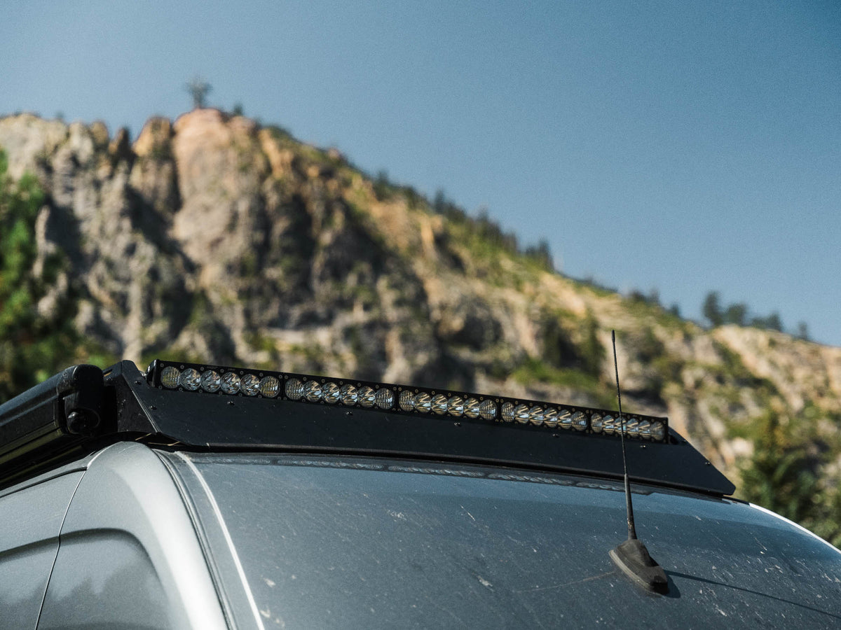 Flatline Van Co. Sprinter Standard Roof Rack 170" with light bar fairing and Baja Designs arc LED light bar installed