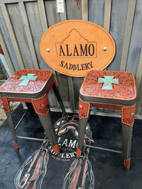 Alamo Saddlery bar stools with turquoise gator cross inlay and full floral hand-tooled toast leather