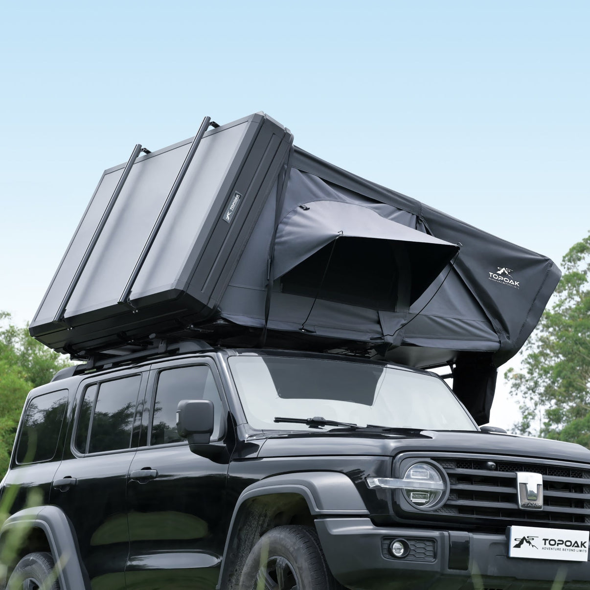 TOPOAK Vision hard shell rooftop tent open on vehicle - side view