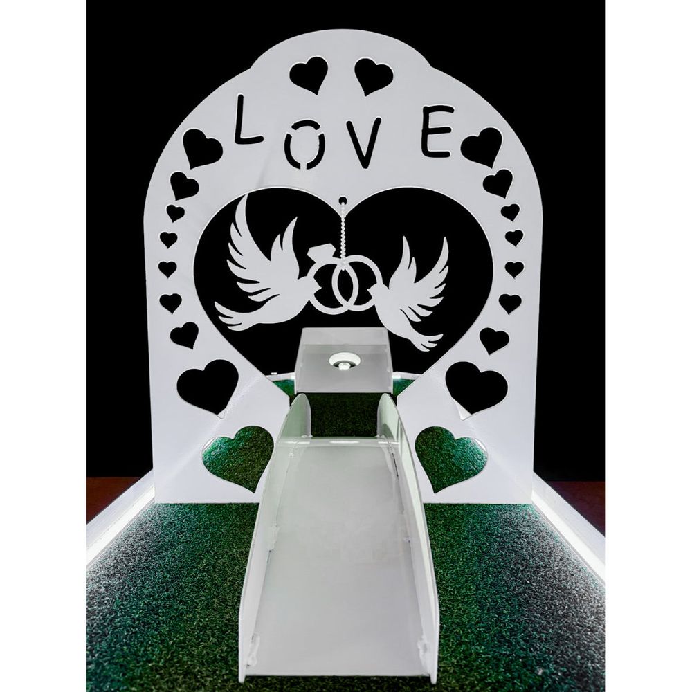 Alumi Games Wedding Obstacle with dove, heart cutouts, and LOVE lettering in white aluminum finish